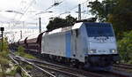 LINEAS NV/SA, Bruxelles [B]  mit der Railpool Lok  186 459-4  [NVR-Nummer: 91 80 6186 459-4 D-Rpool] mit einem Ganzzug Schüttgutwagen mit Schwenkdach am 18.10.23 Höhe Bahnhof Magdeburg Neustadt.