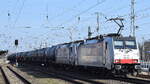 LINEAS Group NV/SA, Bruxelles [B] mit der Railpool Lok  186 450  [NVR-Nummer: 91 80 6186 450-3 D-Rpool] und der RTB CARGO Lok  186 297-8 [NVR-Nummer: 91 80 6186 297-8 D-Rpool] und einem Kesselwagenzug (für Ethanol) am Haken pausiert kurze Zeit im Bahnhof Stendal Hbf., 29.02.24