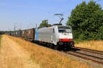 Deutschland 
Lok 186 495 von BLSCN zieht einem Containerzug in Kaarst Broicherseite.
10/7/2026
