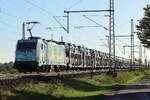 Akiem 186 364-6 in Diensten von HSL kommt mit einem langen Autotransportzug am Fotopunkt in Dedensen-G�mmer vorbei 22.10.2026