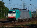 Cobra 186 211 am 14.07.2010 auf dem Weg aus Aachen West ber die Montzenroute nach Belgien. Links im Hintergrund sieht man noch den  Blauen Anton , den Messwagen der RWTH Aachen vom Institut fr Schienenfahrzeuge (IFS).