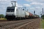 186 184-8 Akiem mit einem Dieselkraftstoff oder Gasl oder Heizl (leicht) Kesselzug in Friesack(Mark) in Richtung Neustadt(Dosse) unterwegs. Netten Gru zurck! 25.05.2011 