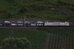 Captrain 186 142 am 24.6.11 mit einem Ford Autozug in Pnderich.