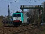 Cobra 186 205 (2813) am 27.03.2012 mit einem gemischten Gterzug auf der KBS 480 zwischen Aachen Rothe Erde und Aachen Hbf nach Aachen West.