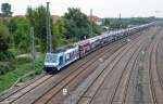 186 110 zog am 08.09.13 einen Autozug von Guben kommend vorbei am Rbf Halle(S) Richtung Hbf. Der Zug hatte die Niederlande als Ziel.
