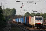 CBR/HSL 186 148 am 7.6.13 mit einem Containerzug in Düsseldorf-Rath.