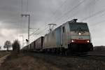 Railpool/Lokomotion/BLS Cargo 186 251 am 28.02.2014 mit dem 42013 aus Wanne-Eikel nach Melzo in Italien, bei der Einfahrt in den Bahnhofsbreich von Müllheim (Baden) gen Süden.