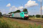 186 246-5 mit voll beladenem Autotransportzug in Fahrtrichtung Süden. Aufgenommen bei Wahnebergen am 22.07.2014.