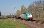 186 135 der Transchem führte am 08.04.19 einen Kesselwagenzug durch Muldenstein Richtung Bitterfeld.