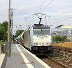 186 299-4 von Lineas/Railpool kommt die Kohlscheider-Rampe hoch aus Richtung Mönchengladbach,Herzogenrath mit einem Kalkleerzug aus Oberhausen-West(D) nach Hermalle-Huy(B) und fährt durch