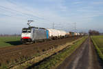 Lineas 186 510 mit einem gemischten Güterzug nach Belgien am 04.12.2019 bei Lindhorst.