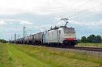 186 446 der Railpool schleppte am 06.07.21 für ihren Mieter Lineas einen Kesselwagenzug durch Braschwitz Richtung Magdeburg.