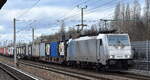 METRANS Rail s.r.o., Praha [CZ] mit der Railpool Lok  186 552   [NVR-Nummer: 91 80 6186 552-6 D-Rpool] und einem Containerzug am 05.01.23 Berlin Blankenburg.