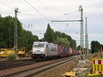 386 016-0 von Metrans zieht am 01.August 2016 einen Containerzug durch Leipzig-Thekla in Richtung Leipzig-Mockau.
