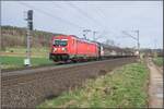 187 194-6 gesehen am 26.03.2024 bei Kerzell mit einem gemischten Güterzug.