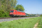 187 142-5 ist am 30.04.2024 bei Himmelstadt mit einem leeren Autozug unterwegs.