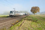 187 073 und eine weitere 187 von Rhein Cargo mit einem Kesselwagenzug bei Retzbach-Zellingen Richtung Würzburg, 13.10.2018