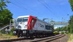 HSL Logistik GmbH, Hamburg [D] mit der EP Cargo Lok  187 086   [NVR-Nummer: 91 80 6187 086-4 D-EPCD] verlässt den Hamburger Hafen mit leeren Containertragwagen, hier am 16.06.21 Hamburg-Harburg.