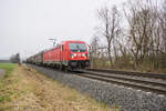 187 133 ist mit einem gemischten Güterzug Richtung Fulda unterwegs,gesehen am 15.02.2023 bei Unterhaun
