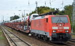 DB Cargo AG [D] mit  189 022-7  [NVR-Nummer: 91 80 6189 022-7 D-DB] mit PKW-Transportzug (VW Nutzfahrzeuge aus polnischer Produktion) am 25.09.19 Berlin Hirschgarten. 