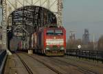 189 072 mit einem Continerzug auf der Rheinbrcke bei Duisburg-Baerl.