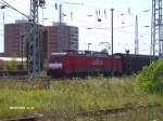 Eine Hollandlatz 189 mit Containerzug in Eisenhttenstadt.02.08.07