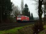 189 023 mit einem Gterzug sdlich von Westbevern. 05.03.2011