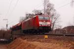 Zwischen Mnchengladbach Hbf und Rheydt Hbf kommt am Freitag den 2.3.2012 die 189 079-7 mit einem gemischten Gterzug  entlang gefahren, hier  ist sie auf der Brcke  An der Landwehr  zu sehen