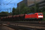 189 049-0 DB kommt durch Aachen-West mit einem Schotterzug aus Richtung Aachen-HBF nach Herzogenrath in  der Abendstimmung am 13.7.2012.