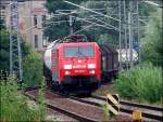 189 046-6 vor TEC55707 hat den Hbf Stralsund verlassen und fhrt weiter zum Seehafen Rostock.   (am 02.08.06)