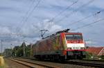 DB Schenker Rail 189 065 ( Tulpenlok ) durchfährt am 25.07.11 den ehemaligen Bahnhof Velpe Richtung Rheine.