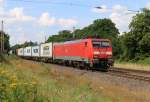 189 017-7 mit Containerzug in Fahrtrichtung Süden. Aufgenommen bei Wahnebergen am 22.07.2014.