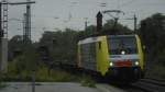 E 189 999FM fuhr an einem regnerischen Tag im August 2007 durch Rastatt am  VOS-Zug .