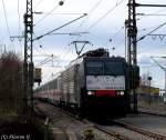 Die ES64F4 - 032(189 932NC), mit dem EC83 am Hacken, von Mnchen Hbf nach Verona Porta Nuova hier bei Zorneding unterwegs.