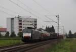 ES 64 F4-090 fhrt bei recht trbem Wetter mit einem gemischtem Gterzug in Richtung Frankfurt/Main.Aufgenommen am 30.09.10 in Lampertheim.