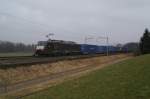 ES 64 F4-103 zieht am 19.2.11 einen Containerzug von Oberrti Richtung Rotkreuz.