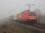 Nebelsichtung. Am Morgen des 24.03.2012 hielt sich der Nebel an der KBS 610 bei Mecklar ziemlich hartnckig. So kam auch 189 801-4 berraschend mit ihrem Warsteiner-Zug Richtung Norden aus der Nebelwand.