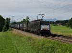 Die ES 64 F4-110 mit einem Containerzug am 23.06.2012 unterwegs bei Hilperting.