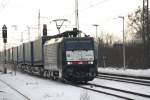 ES 64 F4-997 durchfuhr mit einem LKW Walterzug am 12.12.2012 den Haltepunkt Priort