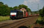 ES 64 F4-038 von MRCE (189-938) ist mit einen Aufliegerzug Richtung Süden unterwegs am 03.06.14 in Vollmerz.