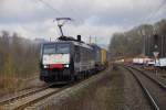 ES 64 F4-115 mit einen Aufliegerzug in Mittelsinn Richtung Süden am 25.02.15.