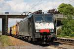 SBB Cargo ES 64 F4-102 bei der Durchfahrt mit einem Containerzug am 11.07.2014 in Orschweier.