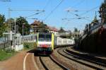 189 912 mit dem ekol-Zug bei der Durchfahrt in Bruchsal-Tunnelstr., 29.09.2015.