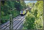 Die E189 904 von Rail TractionCompany bringt einen KLV-Zug aus Italien nach Mnchen Riem. Aufgenommen im Sommer 2005 bei Oberaudorf. Die E189 901-905 gehren heute der RTC.