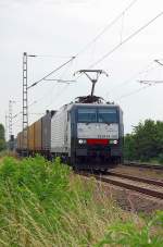 Am Sonntag den 25.7.2010 zog ES 64 F4-991/ alias E189 091/ alias   189 091-2 einen Containerzug nach Venlo und musste hier in Boisheim auf Ausweichgleis damit ein Umleiter ICE passieren konnte.