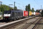 Die 189 992-1 / ES 64 F4 - 092 zieht einen Containerzug durch München Heimeranplatz am 08.09.2012