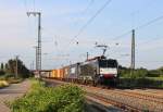 Am 24.Juli 2013 durchfuhr MRCE E189 110 mit Containern den Bahnhof Müllheim(Baden) in Richtung Basel.
