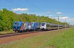 Am 24.05.21 führte 192 009 der TX Logistik ihren KLV-Zug von Rostock nach Italien durch Burgkemnitz Richtung Bitterfeld und begegnet dabei der S-Bahn nach Wittenberg.