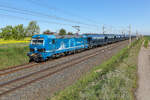 Leuna Lok 192 004 mit D�ngemittel Wagen am 23.4.26 bei Niemberg. Hier w�re vielleicht ein Hochstativ nicht schlecht um die sch�nen Rapsfelder und B�ume im Motiv zu haben, welche nun leider vom Zug verdeckt sind. Am 23.4.26 bei Niemberg.
