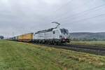193 597-2 mit einen Aufliegerzug bei Himmelstadt am 27.10.2021 unterwegs